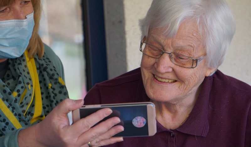 Home health aides can help older individuals navigate technology.